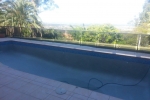 Tallai Blue Glass Pebblecrete Pool Resurfacing – Before